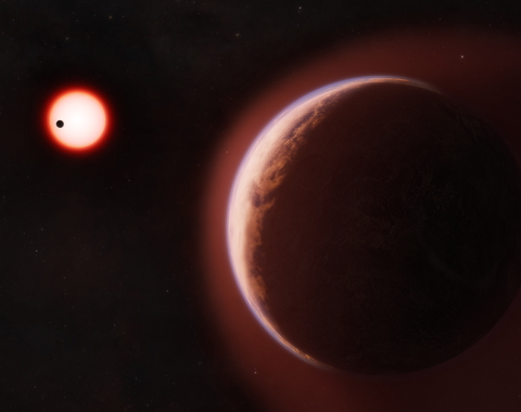 In this artist’s concept, the exoplanet LHS 1140 b is shown in the foreground, surrounded by a helium-rich atmosphere. Another nearby rocky planet orbits the same cool red dwarf star in the distance. Credit: Melissa Weiss/Center for Astrophysics |Harvard & Smithsonian