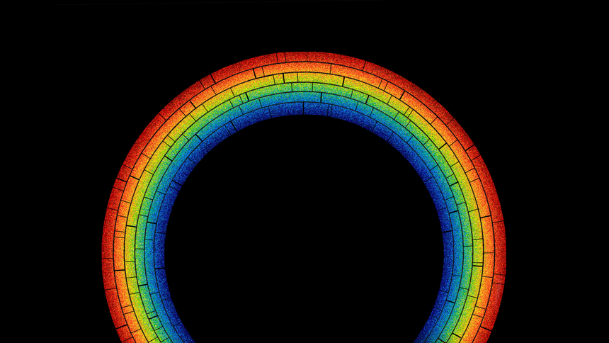 A rainbow arc against a black background. 