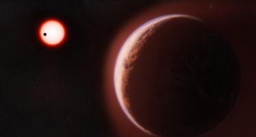 In this artist’s concept, the exoplanet LHS 1140 b is shown in the foreground, surrounded by a helium-rich atmosphere. Another nearby rocky planet orbits the same cool red dwarf star in the distance. Credit: Melissa Weiss/Center for Astrophysics |Harvard & Smithsonian