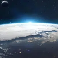 Earth seen from space with human settlements visible and the Moon in the background. Image purchased from Shutterstock. 