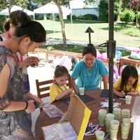 Summer students lead STEM activity. 