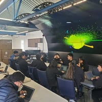 high school students learn about dark matter in the Carnegie Observatories VizLab as part of a DEI Mini-grant funded project