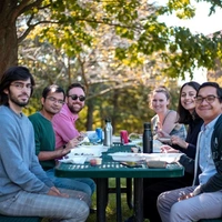 Enjoying Chilean food at a picnic table for Hispanic Heritage Month