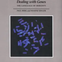 A book cover for "Dealing with Genes: The Language of our Heredity" with some chromosomes on the front. by Maxine Singer and Paul Berg