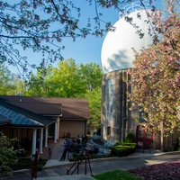 Carnegie Science's Broad Branch Road Campus in Washington, DC, in springtime with cherry blossoms