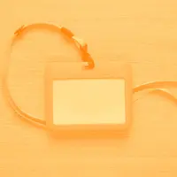 Orange tile with blank name tag