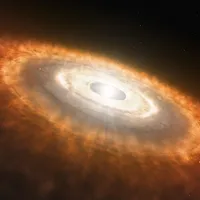 This is an artist’s impression of a young star surrounded by a protoplanetary disk in which planets are forming.   An international team of astronomers have used NASA’s James Webb Space Telescope to provide the first observation of water and other molecules in the highly irradiated inner, terrestrial-planet forming regions of a disk in one of the most extreme environments in our galaxy. These results suggest that the conditions for rocky-planet formation, typically found in the disks of low-mass star-formin