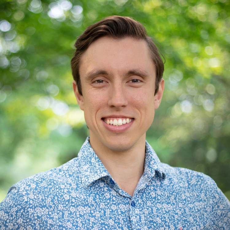 Vasilije Headshot green background