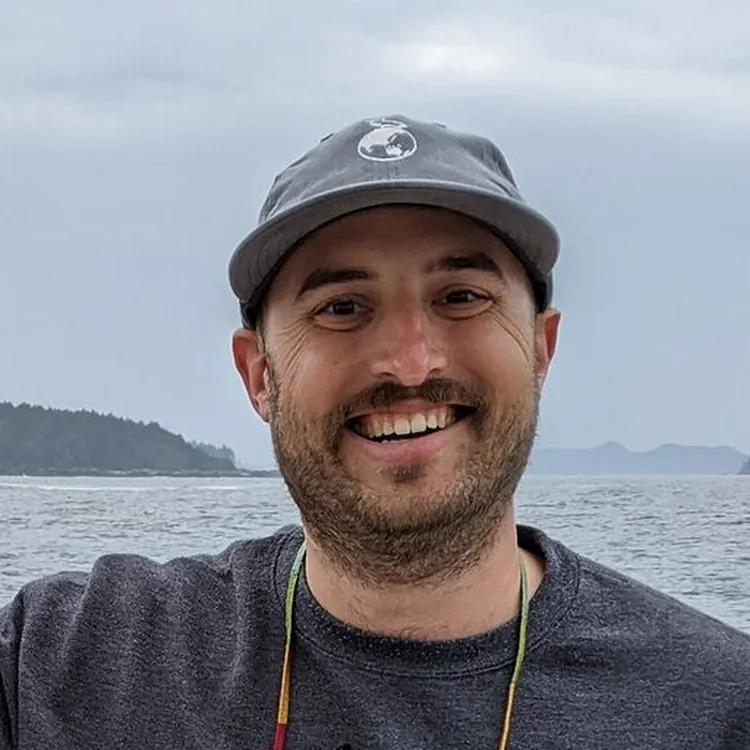 Britt Abrahamson wears a hat on the water