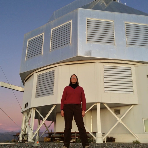Alycia Weinberger in front of Magellan Telescope