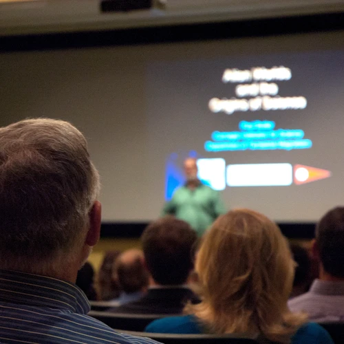 Guests watching Neighborhood Lecture