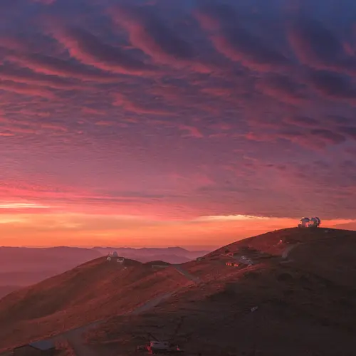 Sunset behind the Magellan telescopes