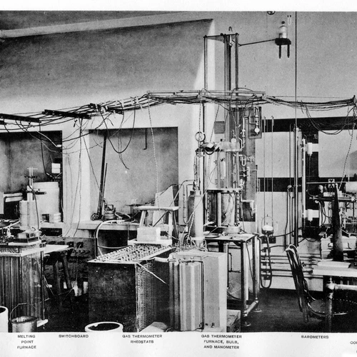 Bank of resistors (lower left corner) for controlling the temperature of an electric furnace in the laboratory of Day and Sosman