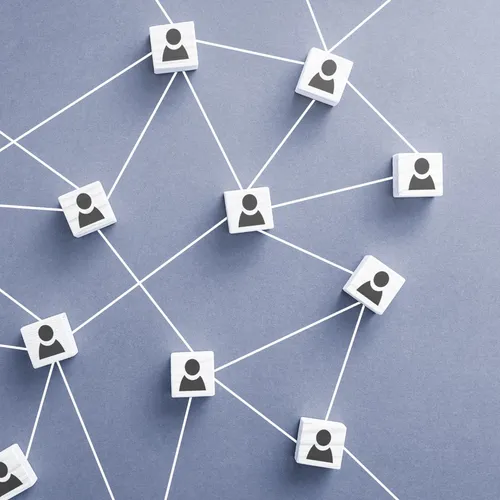 Blocks with human icons on them connected by lines