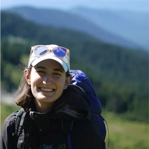 Tara Shreve infront of a volcano