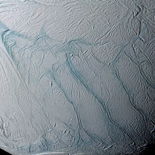 An enhanced color image of the south pole of Saturn’s moon, Enceladus, with the five parallel fissures in the surface, named the Tiger Stripes, clearly visible. This image is a mosaic of 21 false-color frames taken during the Cassini spacecraft’s close fly-by mission on March 9 and July 14, 2005. Image credit: NASA/JPL/Space Science Institute