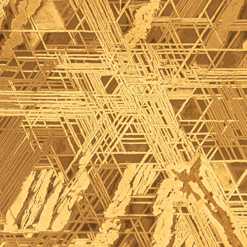 A beautiful illustration of the Widmanstatten pattern, which is characteristic of iron meteorites. Image is courtesy of Peng Ni.