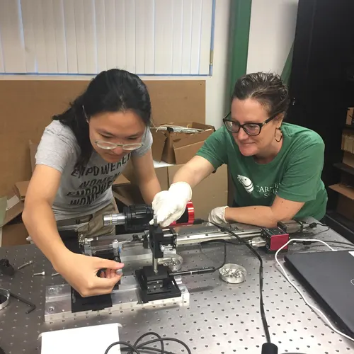 Summer student doing engineering work with a Carnegie postdoc.