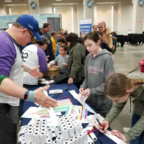Making pocket Solar Systems at Carnegie's booth at the USA Science & Engineering Festival
