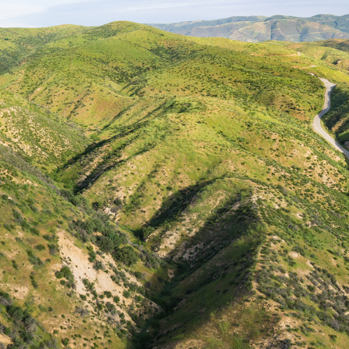 A road winds through the San Gabriel Mountain