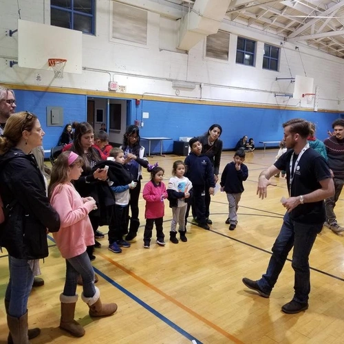 Jeff Rich shows off the inflatable planetarium during an outreach night at Villa Park Community Center in Pasadena