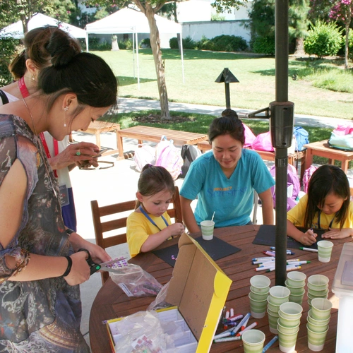 Summer students lead STEM activity. 