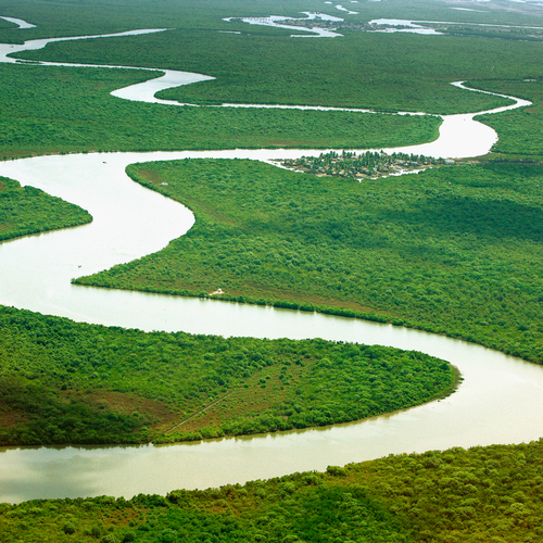 A river in India winds through green countryside as seen from overhead. Purchased from Shutterstock.