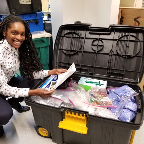 Reviewing supplies for the Amgen Biotech Experience