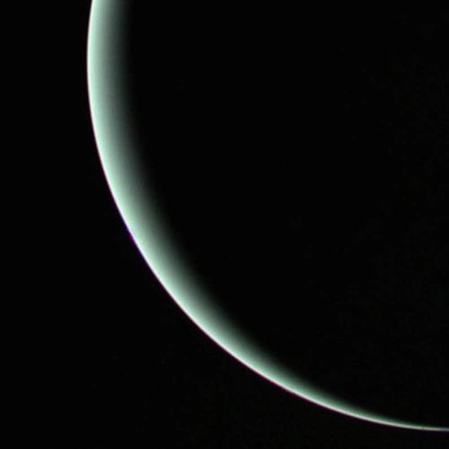 The view of Uranus recorded by Voyager 2 on January 25, 1986, as the spacecraft left the planet behind and set forth on the cruise to Neptune.