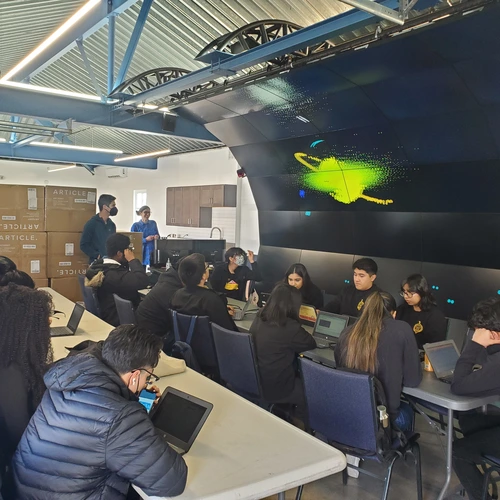 Local high school students work in the VizLab as part of a mini-grant funded outreach program.