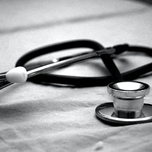 Black and white photograph of a stethoscope. 