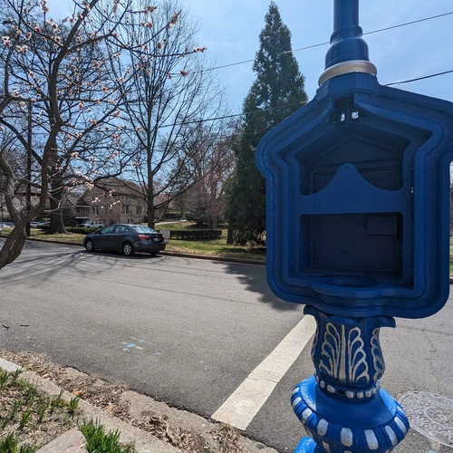 And empty call box on the street near EPL