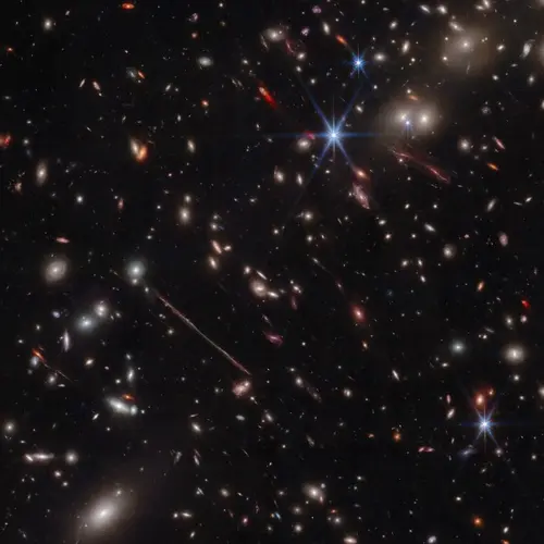 JWST telescope image of a galaxy cluster known as "El Gordo," which is an example of a "cosmic teenager." Credit: NASA/ESA/CSA