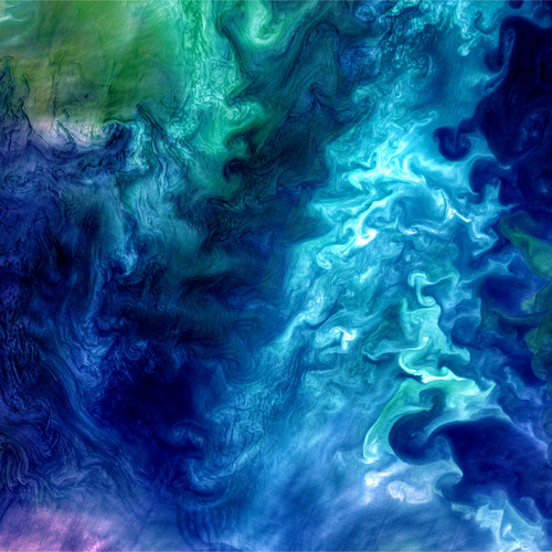 Patterns of blue and green sea water blooms. Colorful splash green, blue, milky turquoise waters. Aerial view diatoms phytoplankton. Ink in water. Abstract background.