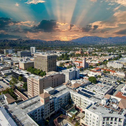 Downtown Pasadena with sun shining through the clouds