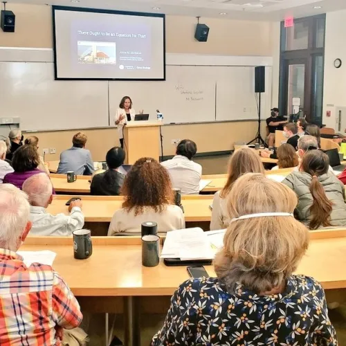 Anna Michalak addresses the retirement symposium for Joe Berry
