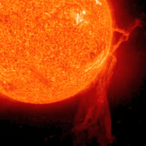 A very long solar filament that had been snaking around the Sun erupted (Dec. 6, 2010) with a flourish. Credit: NASA/GSFC/SOHO