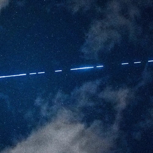 Satellite crosses Night Sky. Sourced from Canva.  Nicole Ruegsegger from Getty Images.