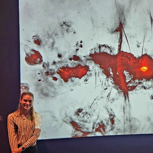 Allison Matthews with the image from the MeerKAT radio telescope. 