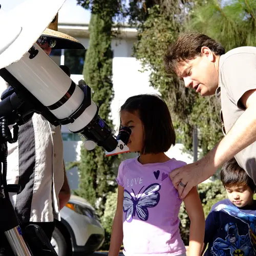 Looking through the telescope at the annual Carnegie Science Observatories Open House.
