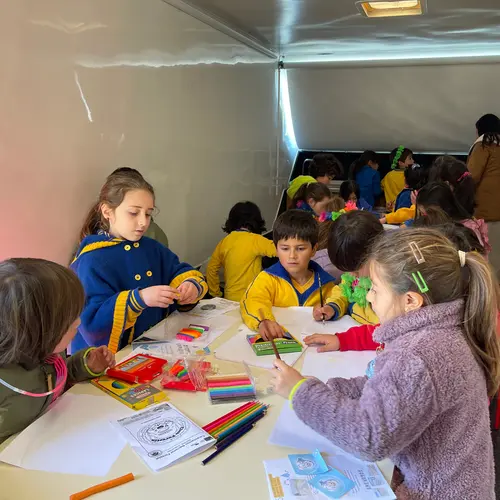 Children participate in a astronomy themed crafting activity during an LCO outreach event